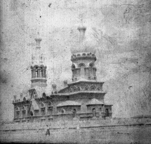 View of the church at Alexandropol (now Gyumri), Armenia. St. Arsenije Church was built circa 1910 to provide Russian Orthodox services to the soldiers stationed at Kazachi, Polygon, and Seversky Posts. When Near East Relief established the world's largest orphanage at the abandoned army posts, it became known as the Kazachi Post church. The orphans attended Armenian Protestant services at the church until the Soviet government forbade religious education. The structure was heavily damaged by several earthquakes and the church was ultimately decommissioned. The ruins of the church still stand.