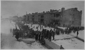 Children outside of the dormitories at Alexandropol in the winter.