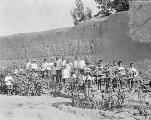 The orphanage gardens provided outdoor exercise, educational training, and -- most importantly -- food for the orphanages.